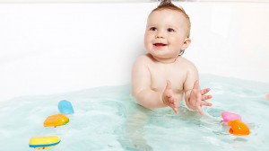 Baby playing in bath