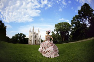 Princess in an vintage dress before the magic castle